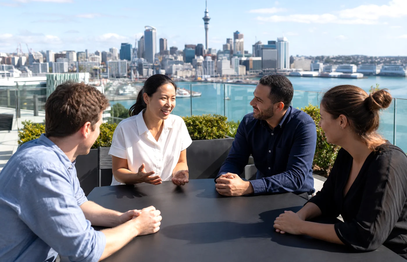 New Zealand business team reviewing mobile app maintenance requirements