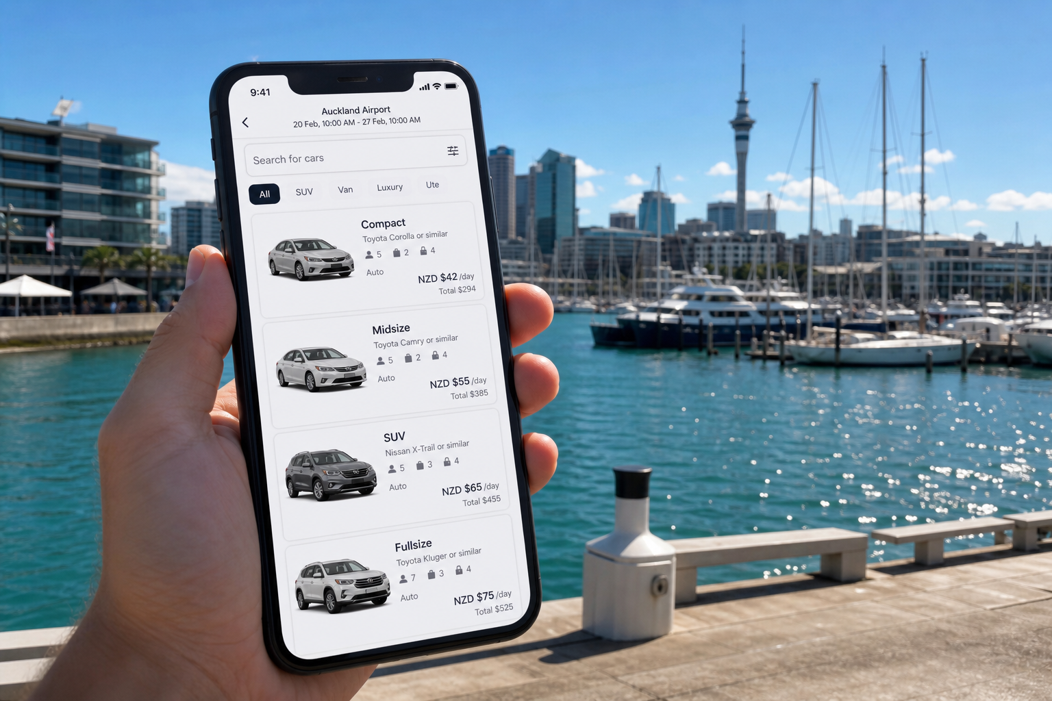 Sunny Auckland waterfront with a smartphone showing a car rental search screen